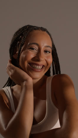 Studio-Beauty-Shot-Of-Young-Woman-With-Long-Braided-Hair-Sitting-At-Table-6